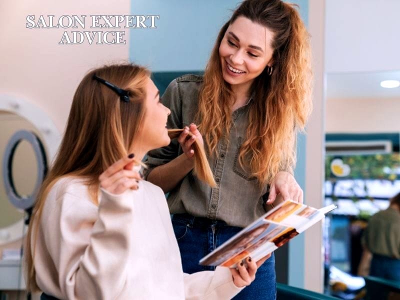 Hairdresser gives expert advice to smiling client while discussing hair loss prevention.