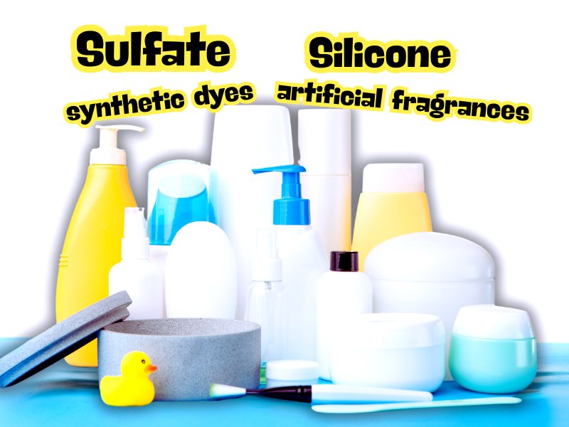 Various personal care bottles with bold warning labels highlighting harmful ingredients like sulfate, silicone, synthetic dyes, and artificial fragrances.