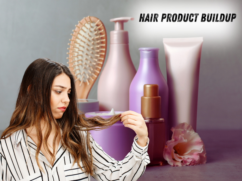 Woman examining hair damage caused by product buildup with haircare bottles in the background.