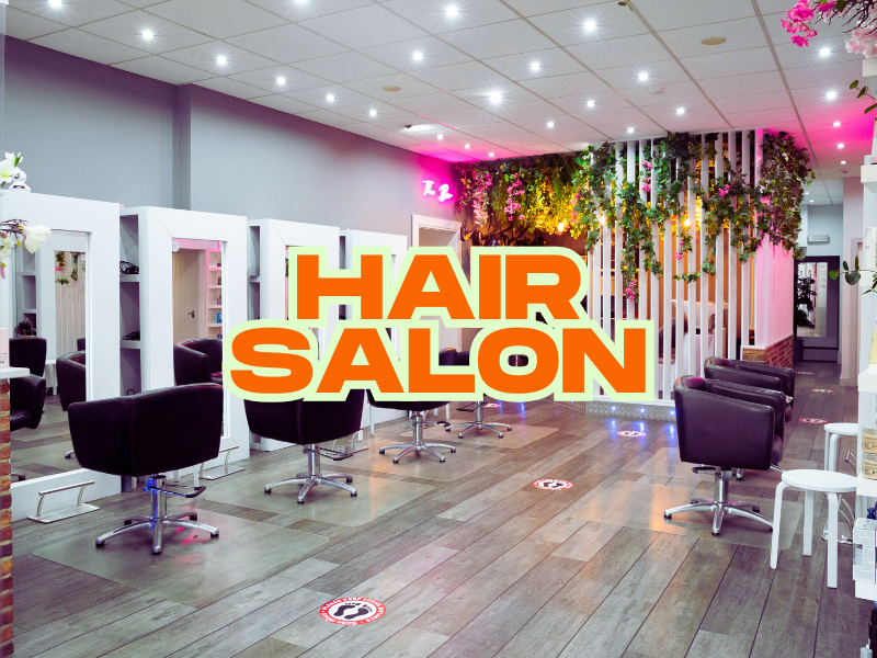 Modern salon with chairs and greenery—highlighting a haircare line that transforms salon spaces.