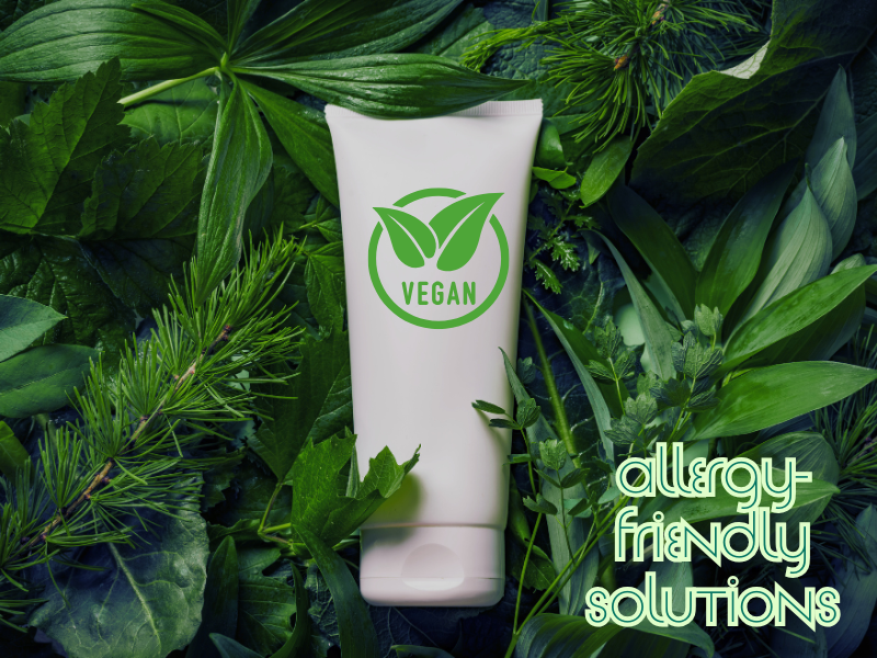 Allergy-friendly vegan formula surrounded by leaves – perfect for clean beauty routines and sensitive scalps